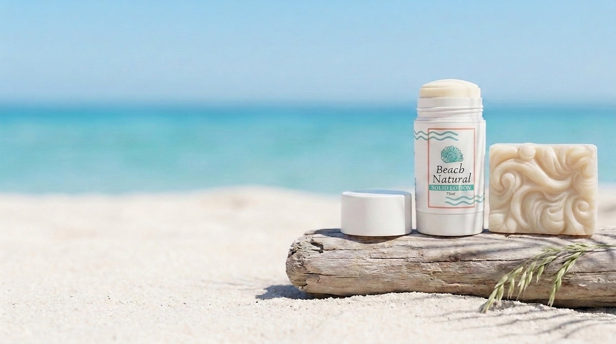 Beach Natural Solid Lotion twist-up tube and solid lotion bar on driftwood at the beach